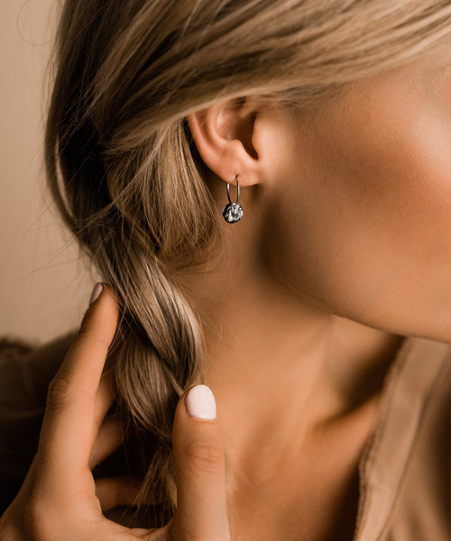 Hypoallergenic Titanium 14mm Sleeper earrings with black round crystal earrings
