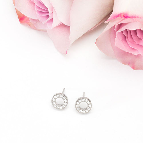 A pair of Blomdahl Silver Titanium 8mm Crystal Puck Hollow hypoallergenic earrings, 10mm in Diameter, hollow in the centre, and highlights 15 precision-cut Swarovski crystals medical sensitive skin friendly nickel free