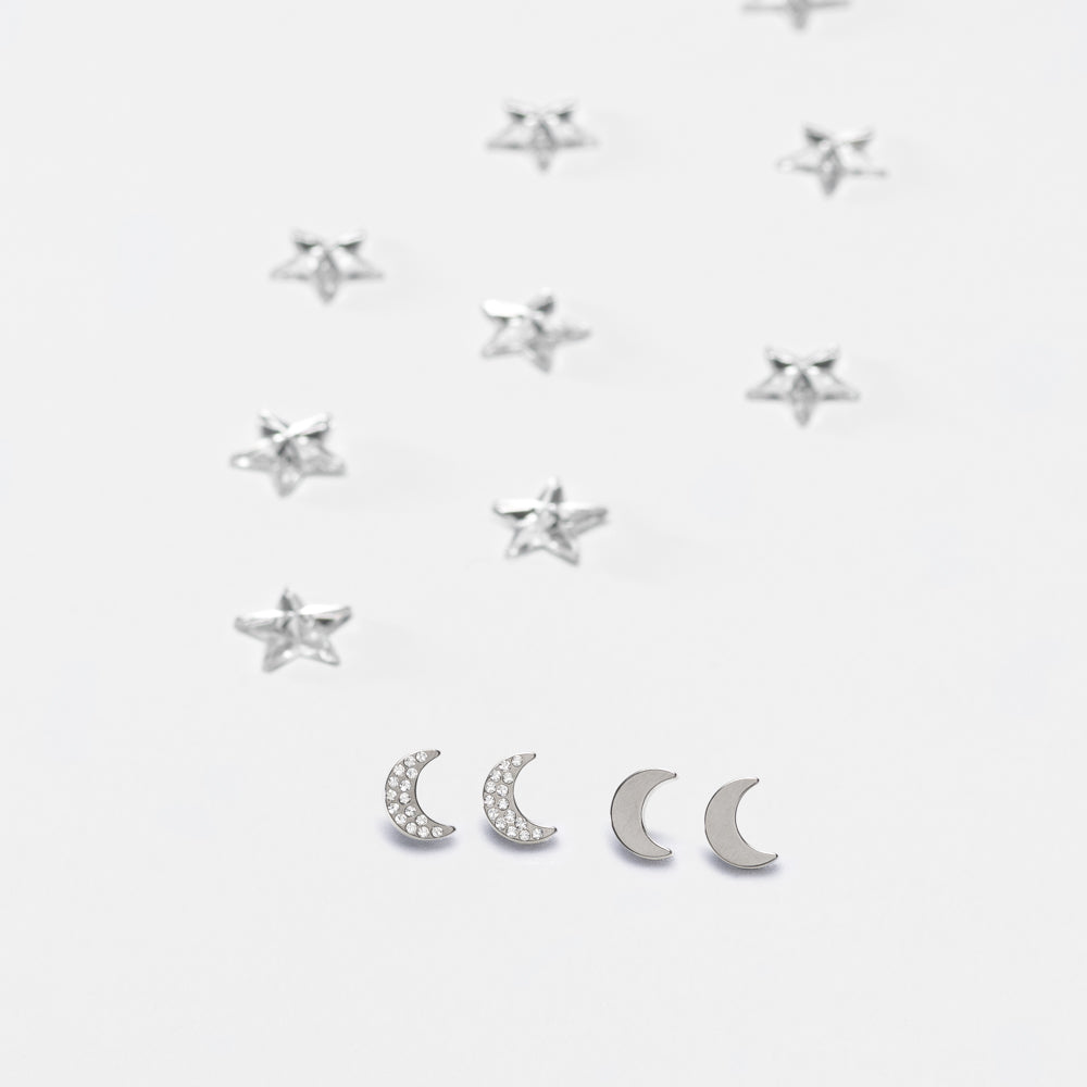A collection of crescent moon earrings from blomdahl for sensitive ears medical sensitive skin friendly nickel free