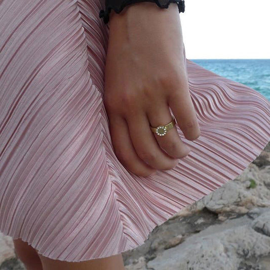 Beach visit wearing gold titanium brilliance puck ring medical sensitive skin friendly nickel free