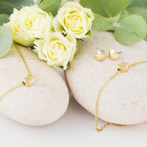 A collection of Gold Heart jewellery, consisting of a pair of earrings, necklace and bracelet and ring from Blomdahl medical sensitive skin friendly nickel free