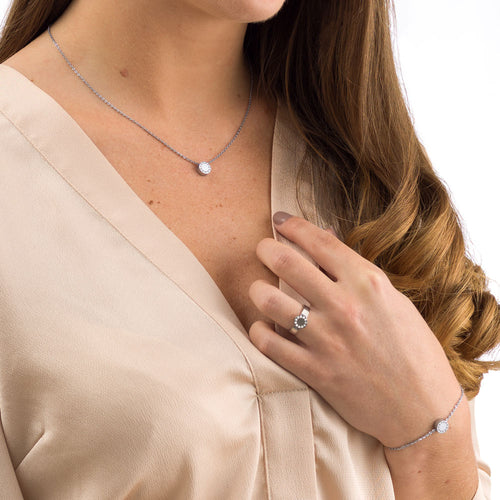 Lady wearing brilliance puck jewellery set - necklace, bracelet and ring medical sensitive skin friendly nickel free